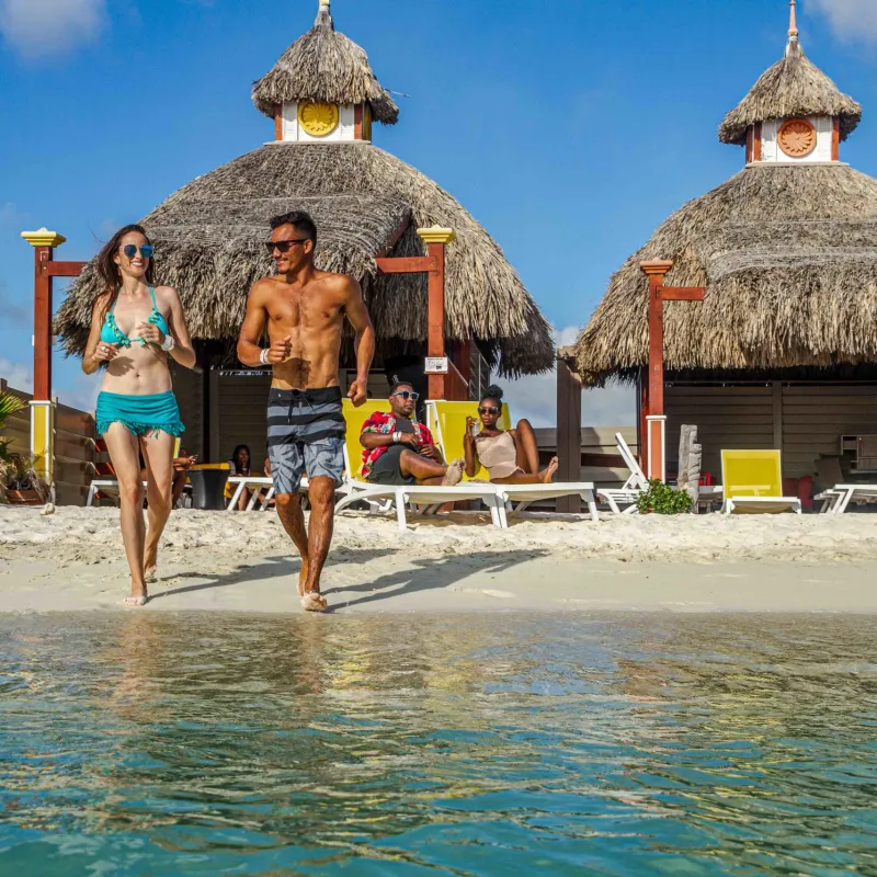 a group of people on a beach