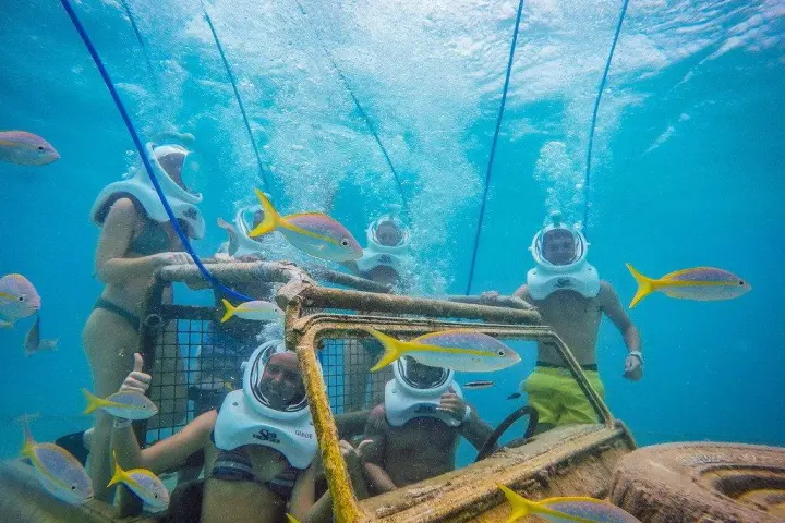 a group of people are underwater