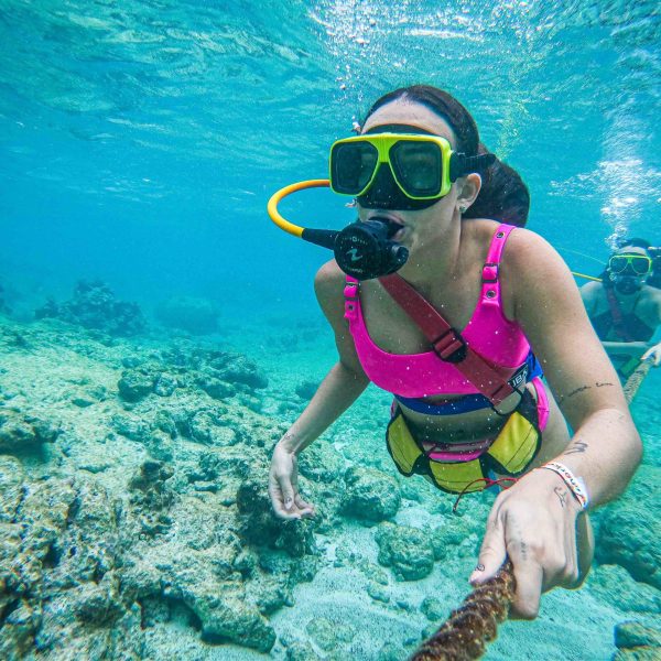a person swimming in a body of water