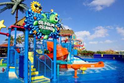 a group of people in a pool of water